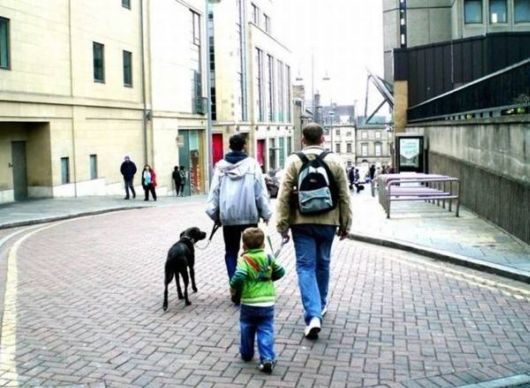 Parents Walk Their Kids On Leashes
